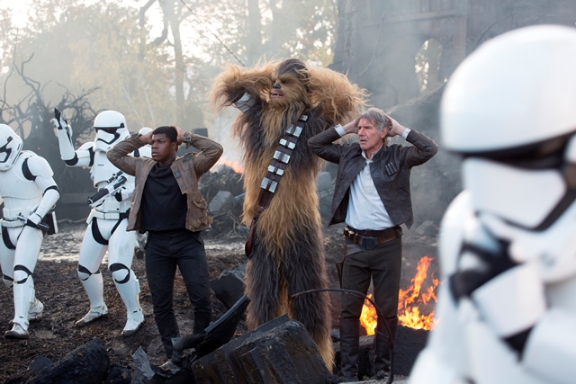 Star Wars: The Force Awakens L to R: Finn (John Boyega), Chewbacca (Peter Mayhew), and Han Solo (Harrison Ford) Ph: David James © 2015 Lucasfilm Ltd. & TM. All Right Reserved.
